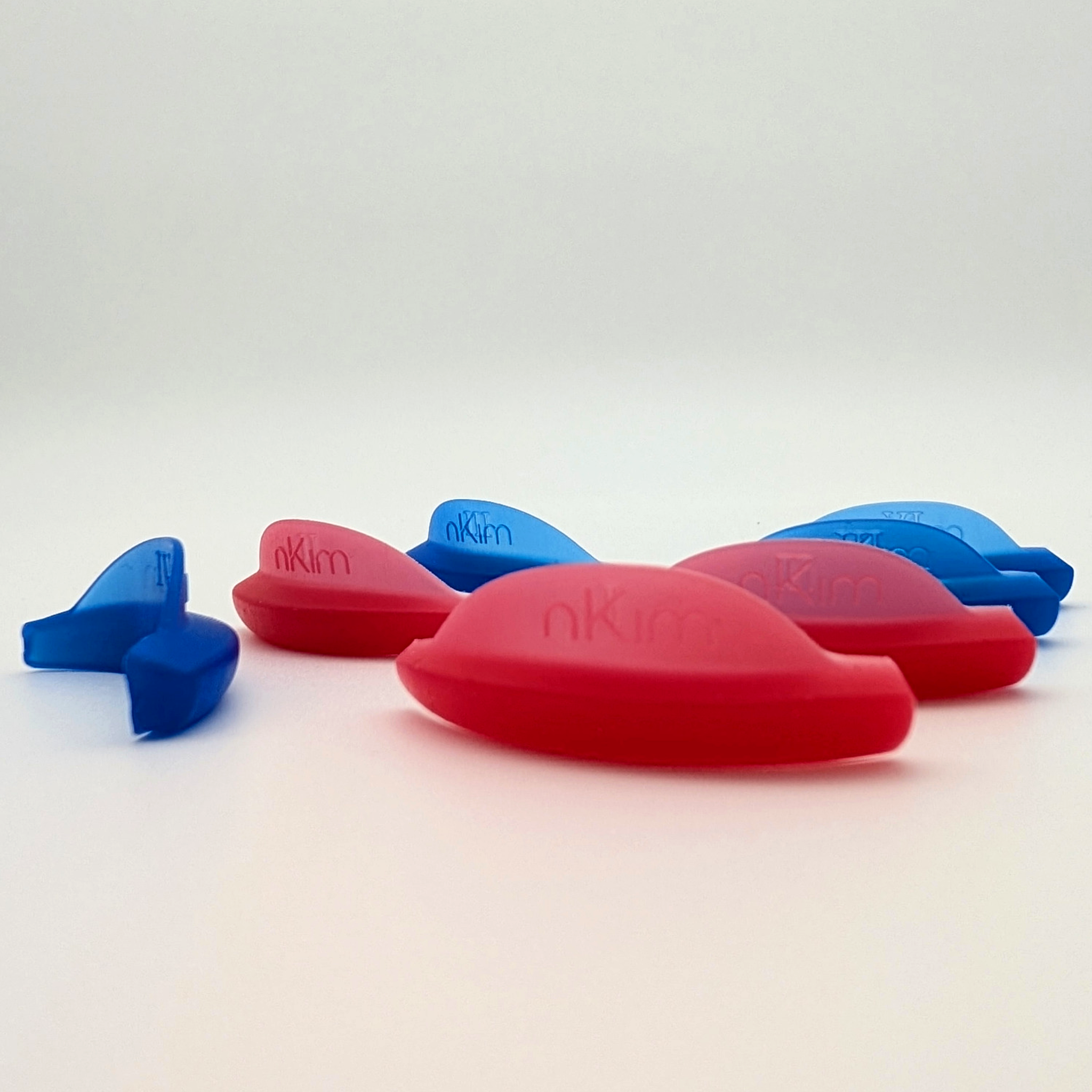 nKim Lash Lift soft silicone Pads – farbige Silikonpads in verschiedenen Größen, Flatlay auf weißem Hintergrund